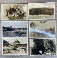 All six postcards laid out for overview