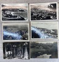 Six postcards laid out, showing fronts