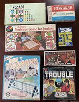 Group shot of all seven boxed games
