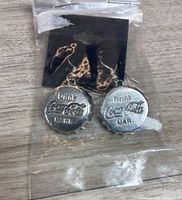 Earrings in sealed package, front view