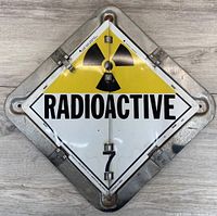 Full view of flip placard showing radioactive panel in frame