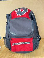 Front view showing DeMarini logo, front pocket, mesh sides