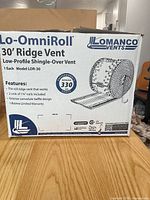 Front of box showing Lomanco Lo-OmniRoll 30′ Ridge Vent model LOR-30 features