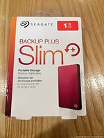 Front of sealed Seagate Backup Plus Slim 1 TB box