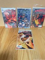 Group shot of four bagged Nightmare on Elm Street comic issues