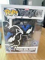 Front view of boxed Funko Pop showing figure, number 676, exclusive sticker