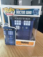 Front view of boxed Funko Pop TARDIS figure