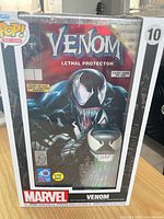 Front view of sealed Funko Pop Venom Comic Covers box showing figure and comic art