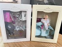 Front view of both boxed Hallmark Keepsake Barbie ornaments