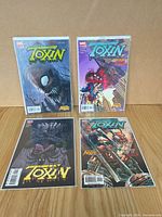 Four bagged and boarded Toxin issues 1,2,4,5 front covers