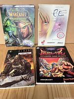 Group shot of all four books front covers visible