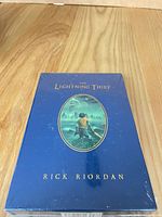 Front view of sealed collector’s edition hardcover