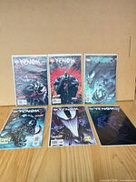 Six Venom variant comics issues 1-6 displayed