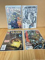 All four Venom: The Hunger issues displayed in bags with boards