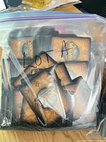 Bag labeled Lot A showing backs of WoW TCG cards