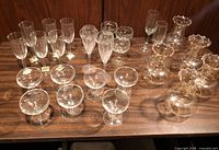 Group shot of assorted glassware and amber ruffled-rim pieces