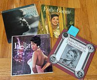 Four of the album covers laid out: Dionne Warwick, Eydie Gormé, Della Reese, Helen O’Connell