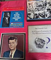 Four JFK-related LP covers laid out