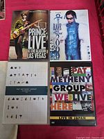 Front covers of all four concert DVDs
