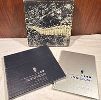 Outer lunar-image slipcase and contents displayed
