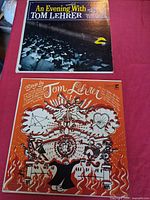 Front covers of both Tom Lehrer LPs