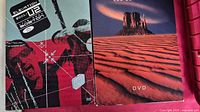 U2 and Led Zeppelin DVD slipcases front view