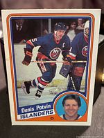 Card front showing Denis Potvin in Islanders uniform with inset portrait