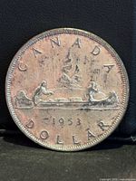 Reverse of 1953 Canadian Voyageur silver dollar