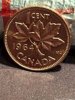 Reverse of 1964 Canada cent showing maple leaf design and date