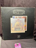 Front gatefold cover with artwork and visible edge wear