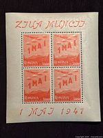 Front view of miniature sheet showing four stamps and margin inscriptions