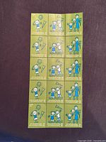 Full view of the 12-stamp sheet