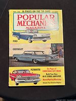 Front cover showing title, date, car illustrations