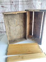 Two wooden crates and three of the four bamboo slat panels