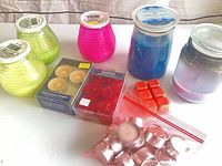 Group shot of all candles, tealights, wax melts