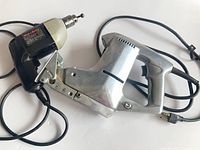 Black & Decker drill and Shopmate reciprocating saw full view with cords