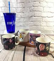Group shot showing all four mugs and one tumbler