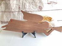 Full view wooden angel plaque on stand