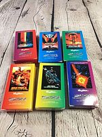 Front view of six sealed SkyBox Star Trek card set boxes