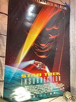 Full view of Star Trek: Insurrection poster hung vertically