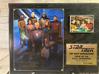 Full plaque showing main photo, inset photo, and brass plate