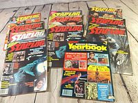 Group shot of all 11 Starlog magazines and Yearbooks spread out