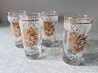 Four tumblers showing overall pattern and quantity