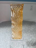 full front view of amber bark-textured vase