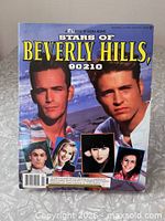 Front cover showing title, main cast photos