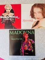 Group shot showing all three Madonna record sleeves