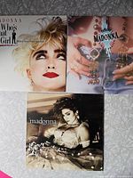 Group shot of the three Madonna album covers