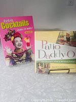 Both books standing: Retro Cocktails and Patio Daddy-O covers visible