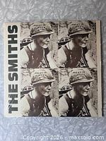 Front cover of Meat Is Murder LP showing soldier graphic and band name