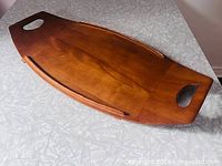 Top view showing full board with handles and raised edges